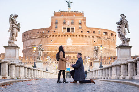 Epic early-morning surprise proposal on Castel Sant'Angelo Bridge in Rome