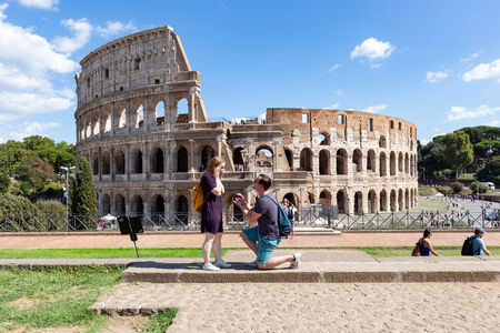 Romantic wedding proposal with the Colosseum in the background