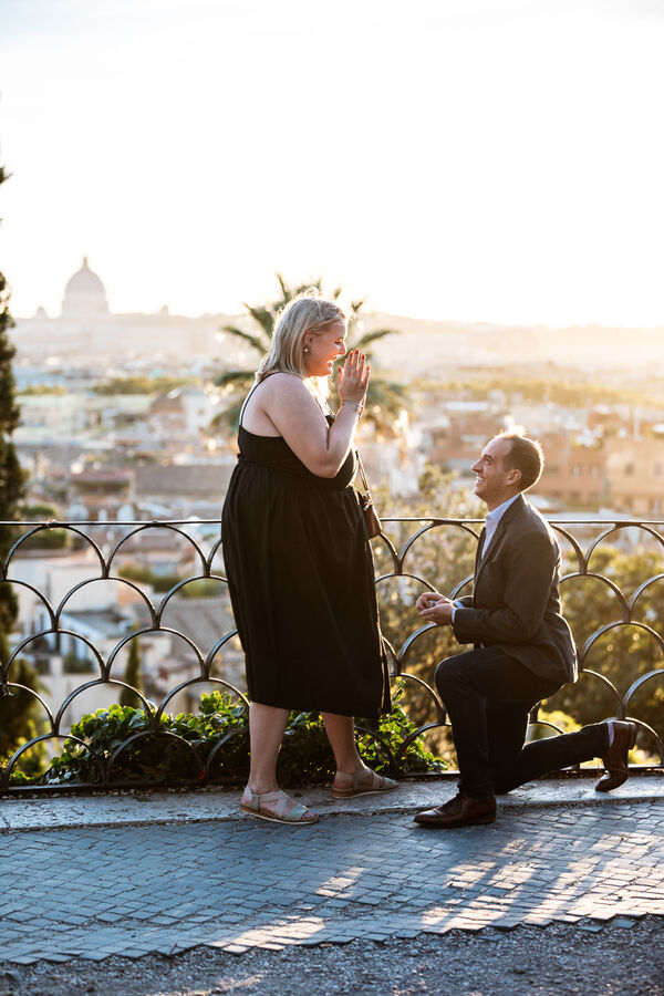 Surprise marriage proposal at sunset on the Terrazza Belvedere in Rome