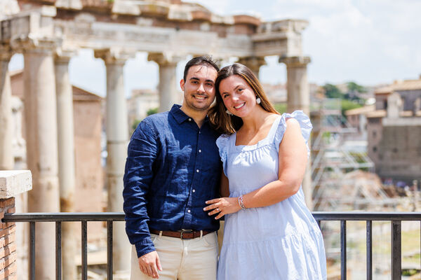 Happy couple at the Roman Forum outlook on the Capitoline Hill during their surprise proposal photo shoot in Rome