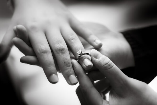 Detail of the engagement ring during surprise proposal photo shoot in Rome