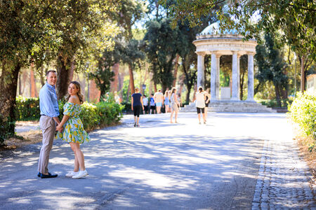 Newly-engaged couple near the Temple of Diana in Villa Borghese in Rome 