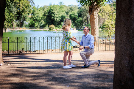 Romantic surprise marriage proposal at the Aesculapius Temple on the lake in Villa Borghese in Rome