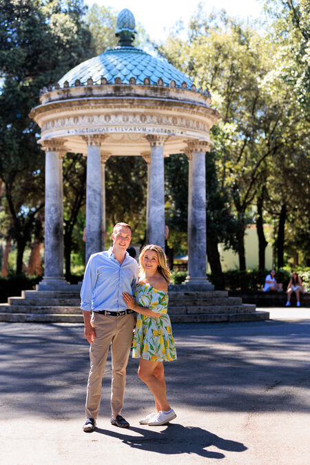 Beautiful newly-engaged couple at the Temple of Diana in Villa Borghese in Rome