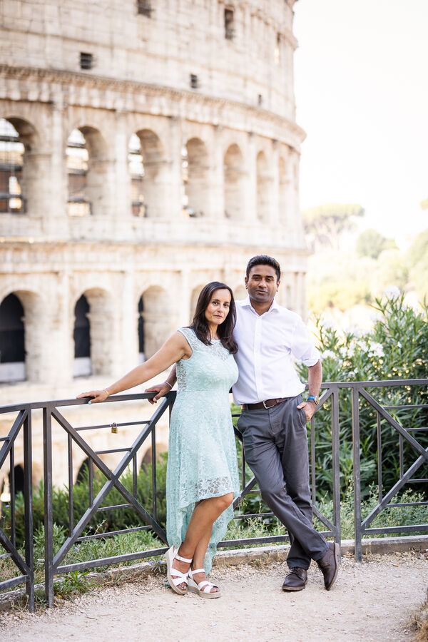 Couple during their engagement photo session at the Colosseum in Rome