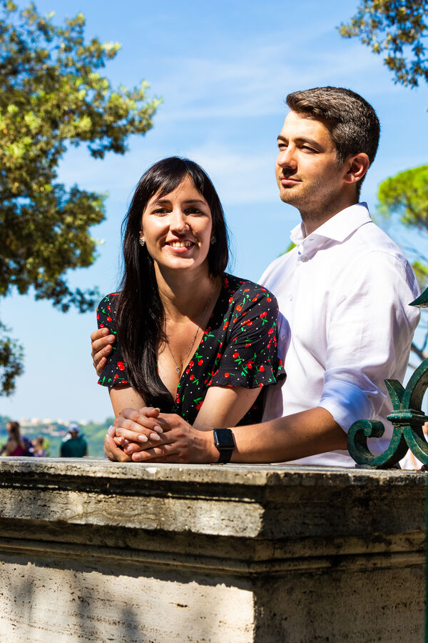 Beautiful couple smiling during their vacation photoshoot in Rome