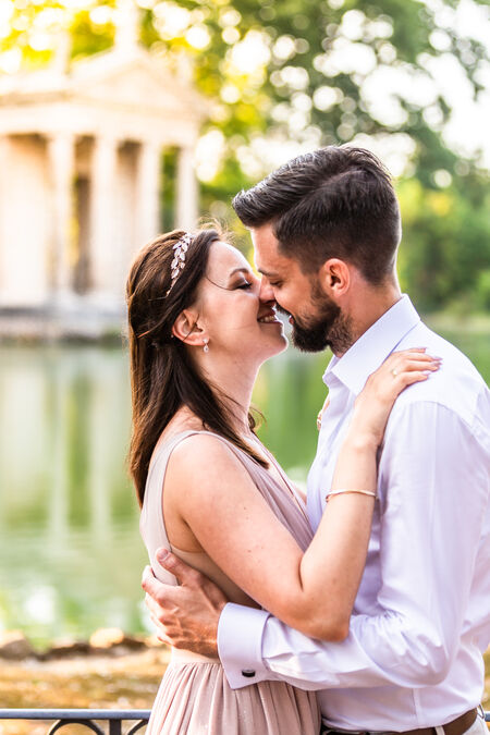 Couple while kissing at the Villa Borghese Lake