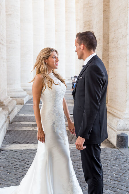 A beautiful couple during a Sposi Novelli Photoshoot in Saint Peter's Square